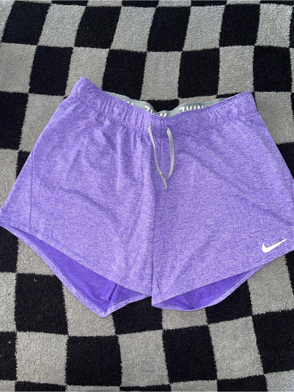 Nike Women's Heather Purple Athletic Shorts with White Swoosh
